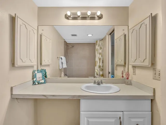 a view of a balcony with an ocean view