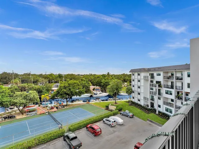 a view of a swimming pool with a terrace