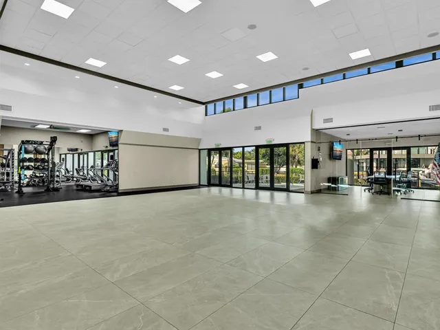 an aerial view of residential building and parking space