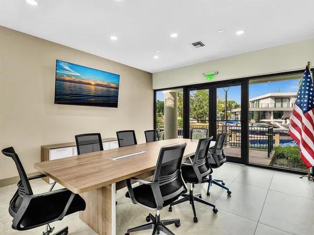 an aerial view of residential building and ocean