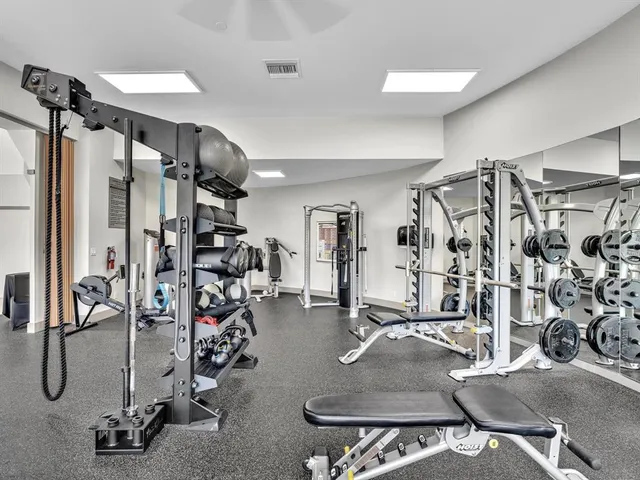 an aerial view of a house with a yard and potted plants