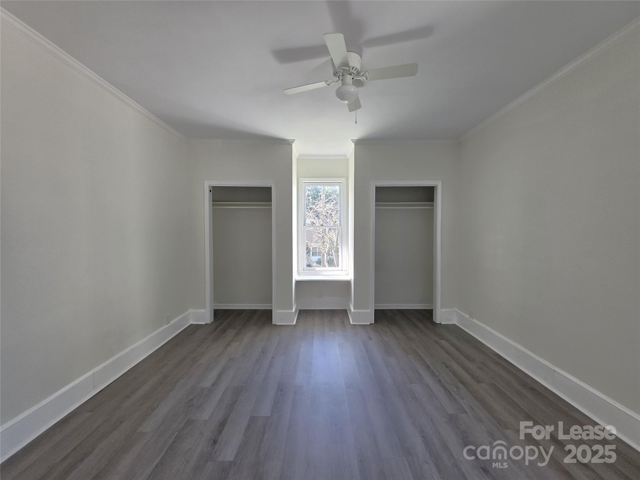 106 Falls Road Badin, NC 28009 - Photo 13 of 19 wooden floor in an empty room with a window