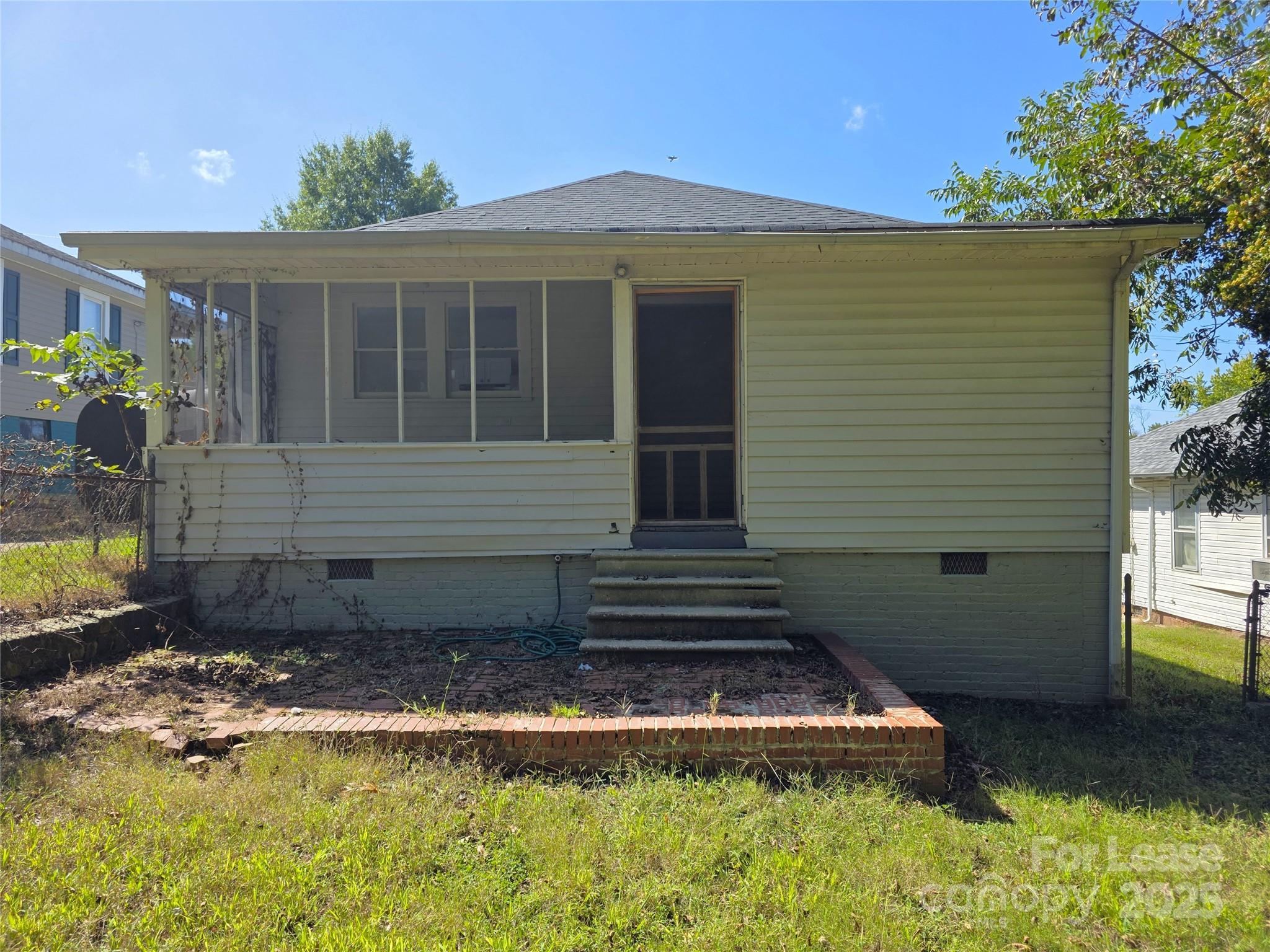 106 Falls Road Badin, NC 28009 - Photo 17 of 19 a front view of a house with a yard