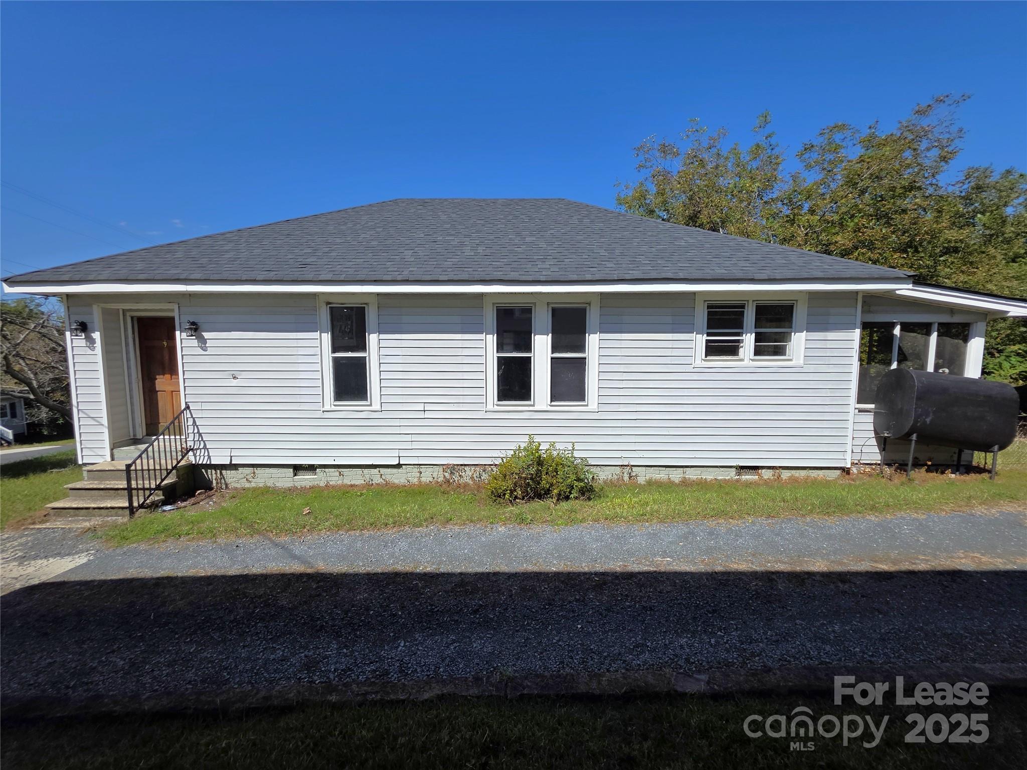 106 Falls Road Badin, NC 28009 - Photo 19 of 19 a view of a house with a yard and sitting area