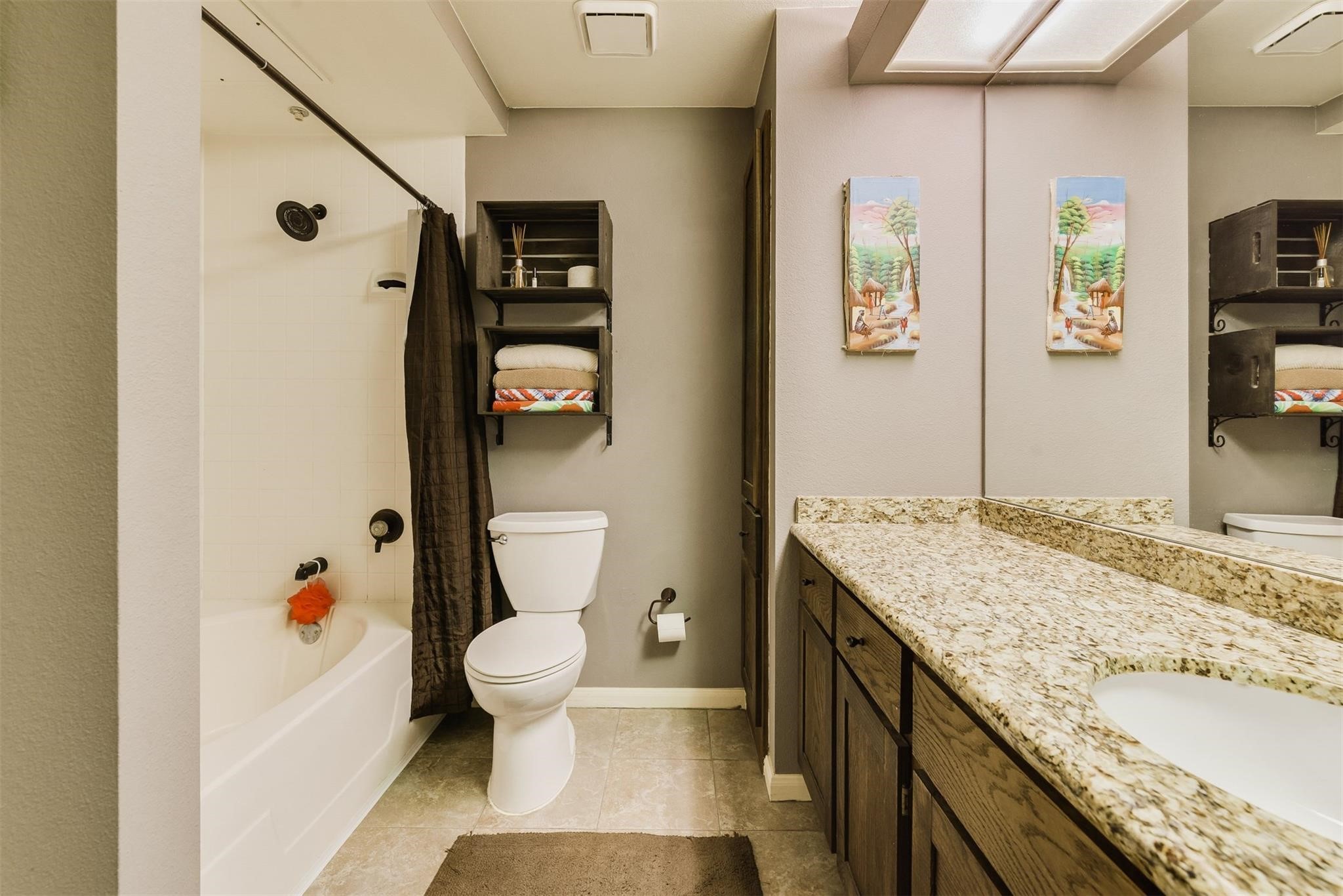 3231 Allen Parkway, Unit 1110 Houston, TX 77019 - Photo 12 of 17 a bathroom with a granite countertop sink toilet and shower