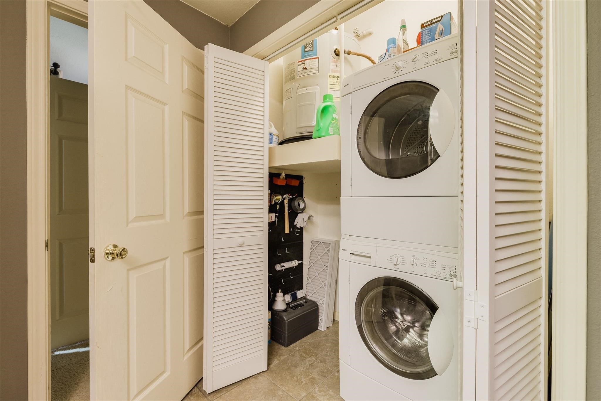 3231 Allen Parkway, Unit 1110 Houston, TX 77019 - Photo 15 of 17 a utility room with dryer and washer