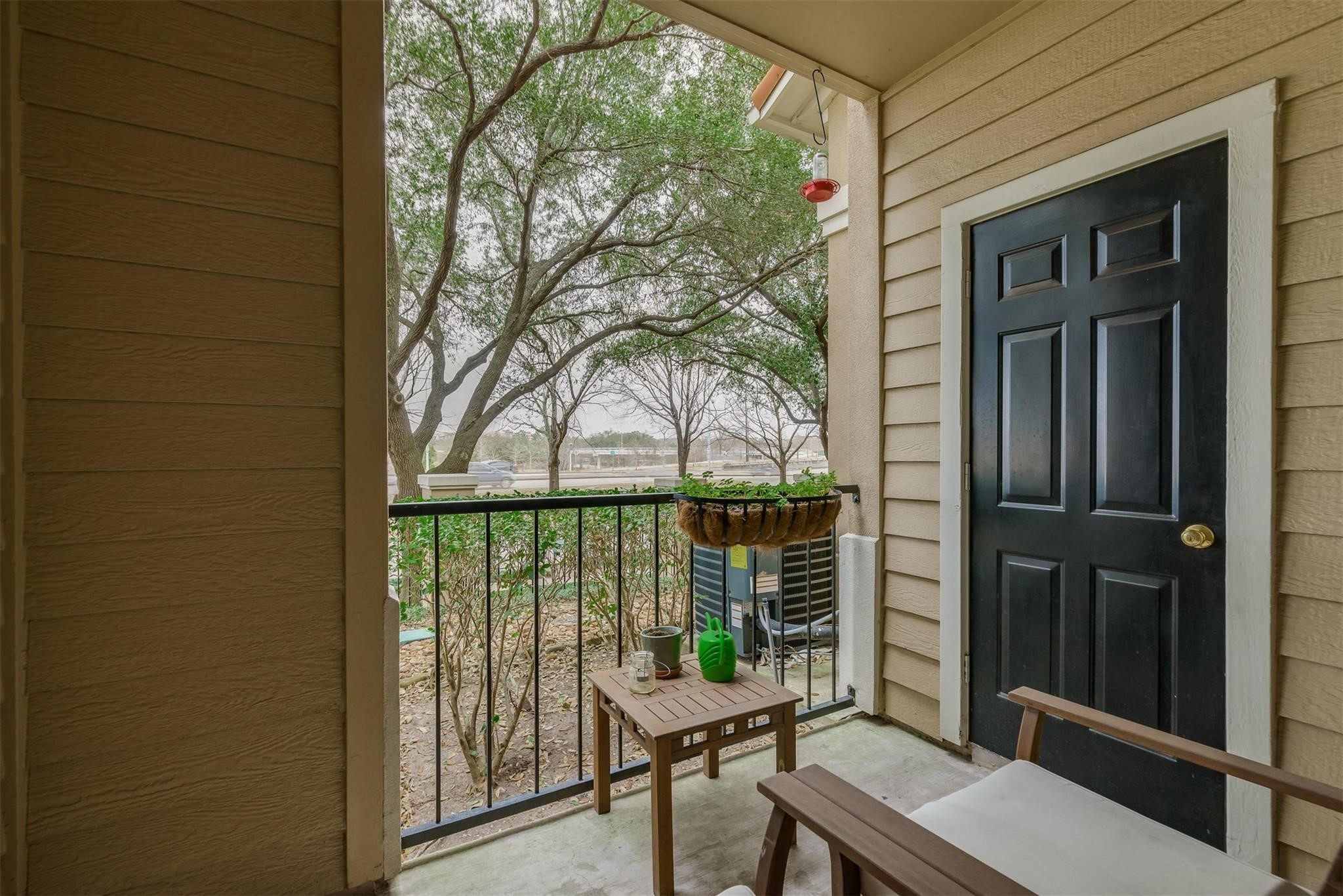 3231 Allen Parkway, Unit 1110 Houston, TX 77019 - Photo 16 of 17 a view of a balcony with lake view and a potted plant