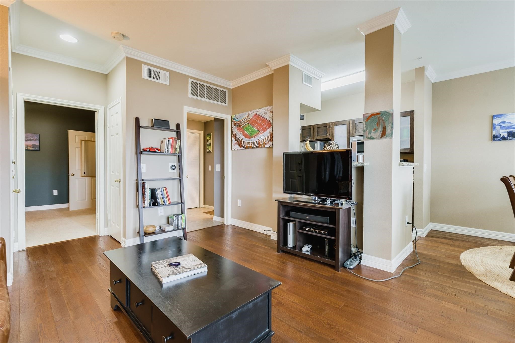 3231 Allen Parkway, Unit 1110 Houston, TX 77019 - Photo 17 of 17 a living room with furniture and a flat screen tv