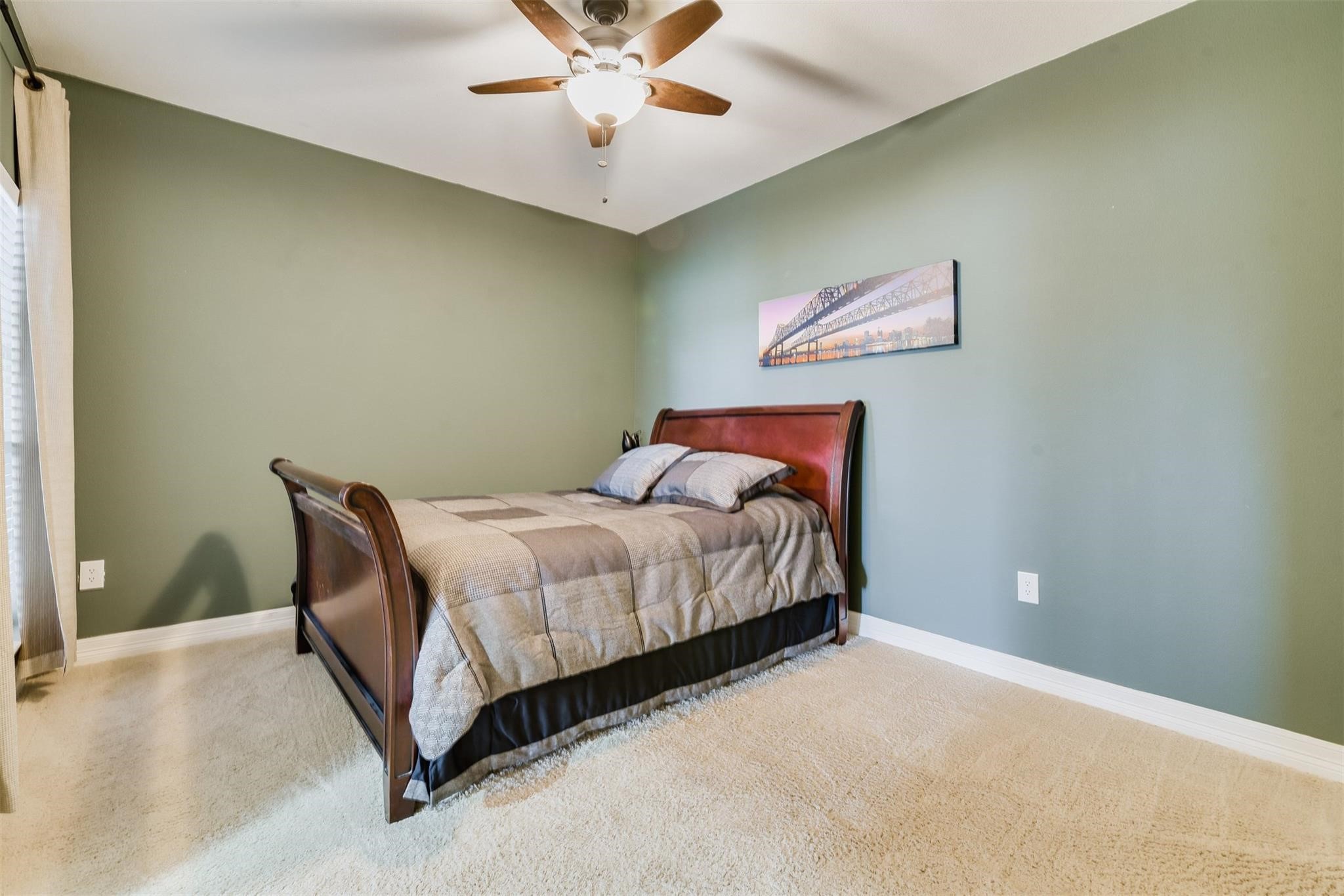 3231 Allen Parkway, Unit 1110 Houston, TX 77019 - Photo 9 of 17 a bedroom with a bed and a chandelier