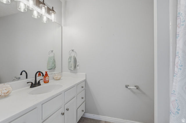 282 West 960 South, Unit C Provo, UT 84601 - Photo 21 of 33 Full bath featuring vanity and curtained shower