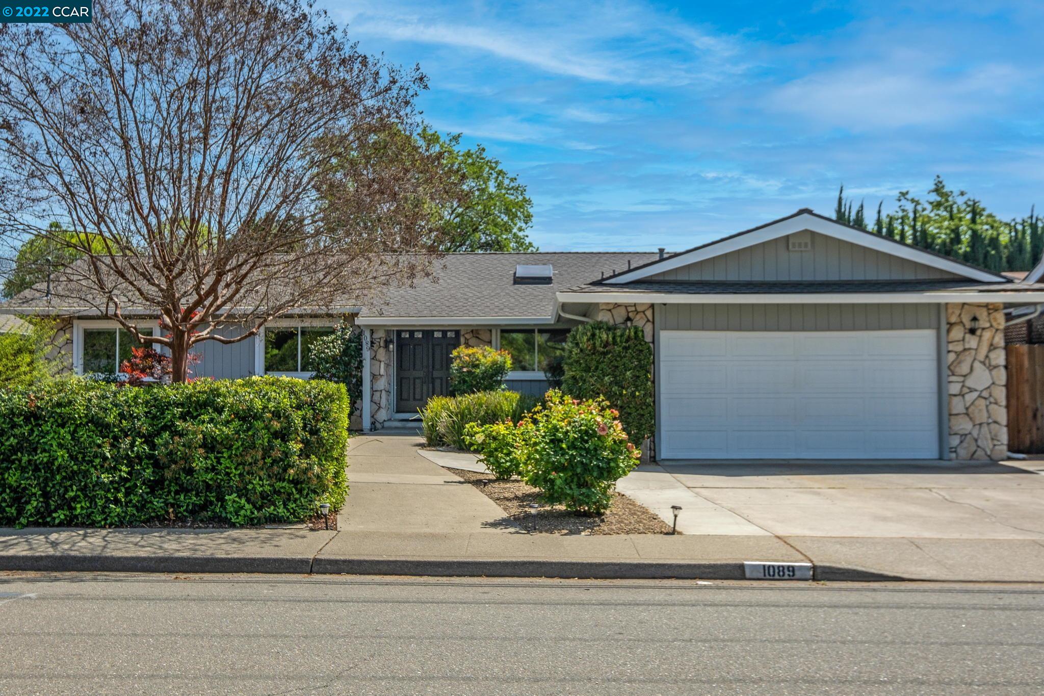 1089 Arkell Road Walnut Creek, CA 94598 - Photo 1 of 1 a front view of a house with garden