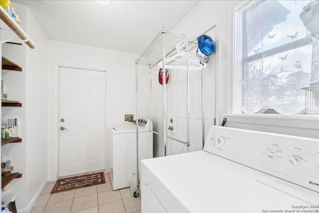 a room with a bed and a window