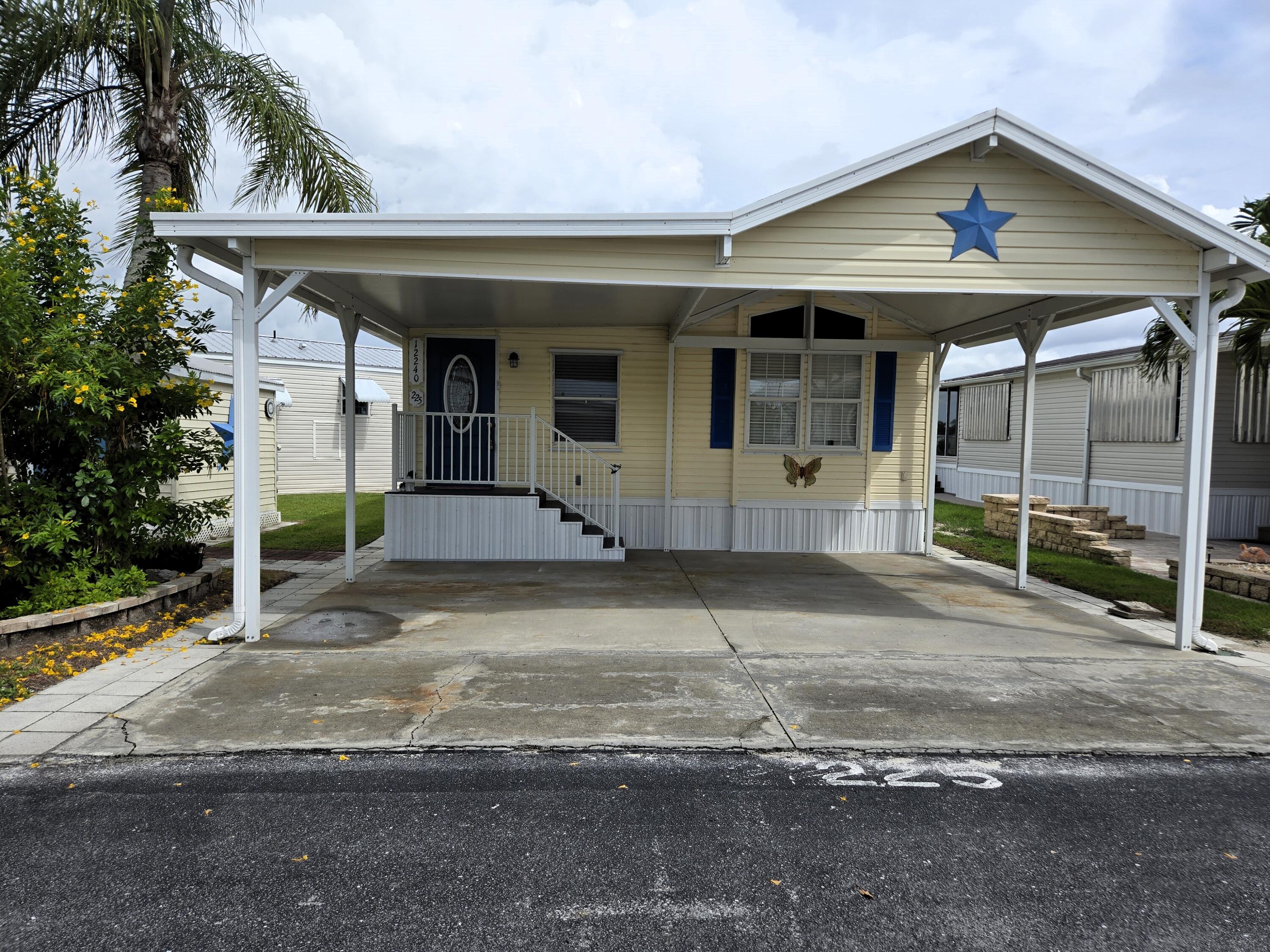a front view of a house with a porch