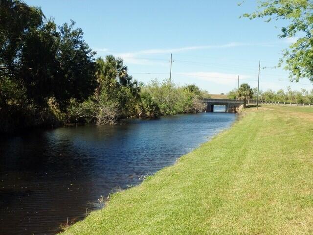 12240 Southeast 138th Avenue, Unit 225 Okeechobee, FL 34974 - Photo 47 of 50 a view of a lake with houses