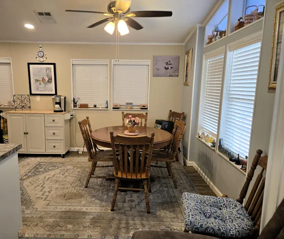 a view of a dining room with furniture