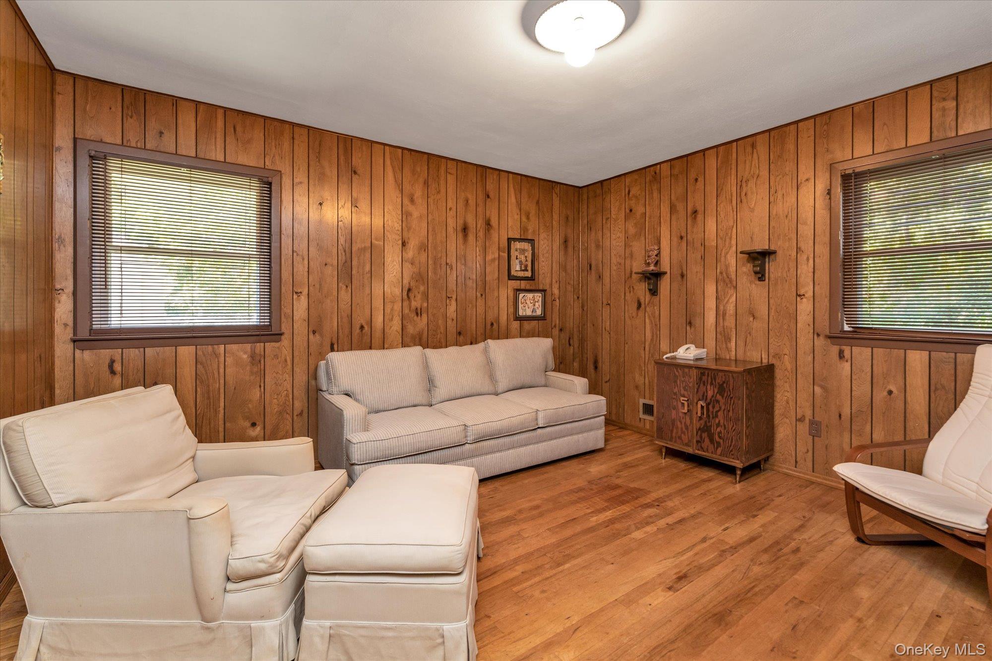 180 Dogwood Road Roslyn, NY 11576 - Photo 12 of 21 a living room with furniture and a window
