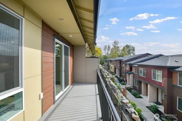 a view of an buildings from a balcony