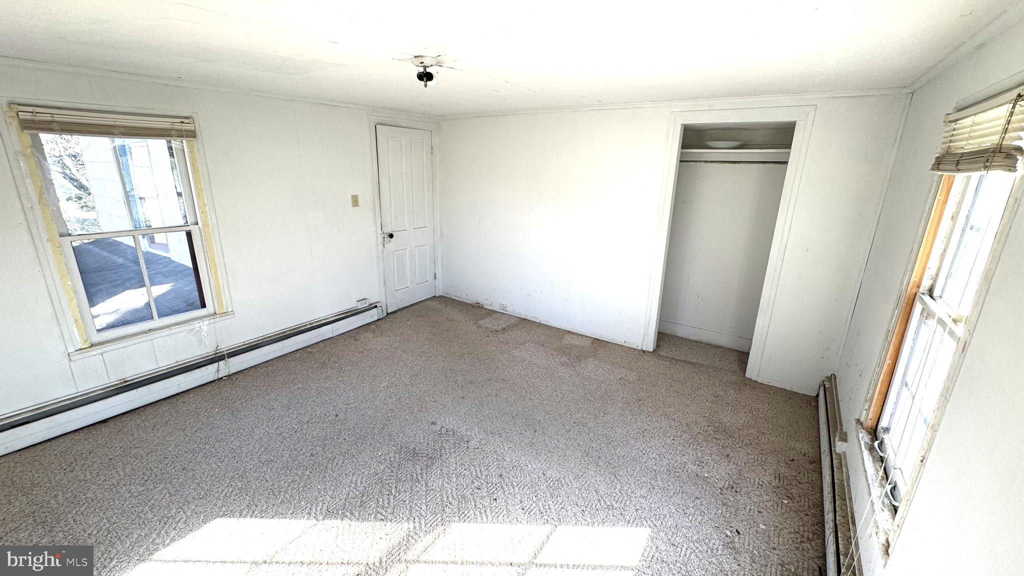 28207 Nanticoke Road Salisbury, MD 21801 - Photo 12 of 26 a view of an empty room and window