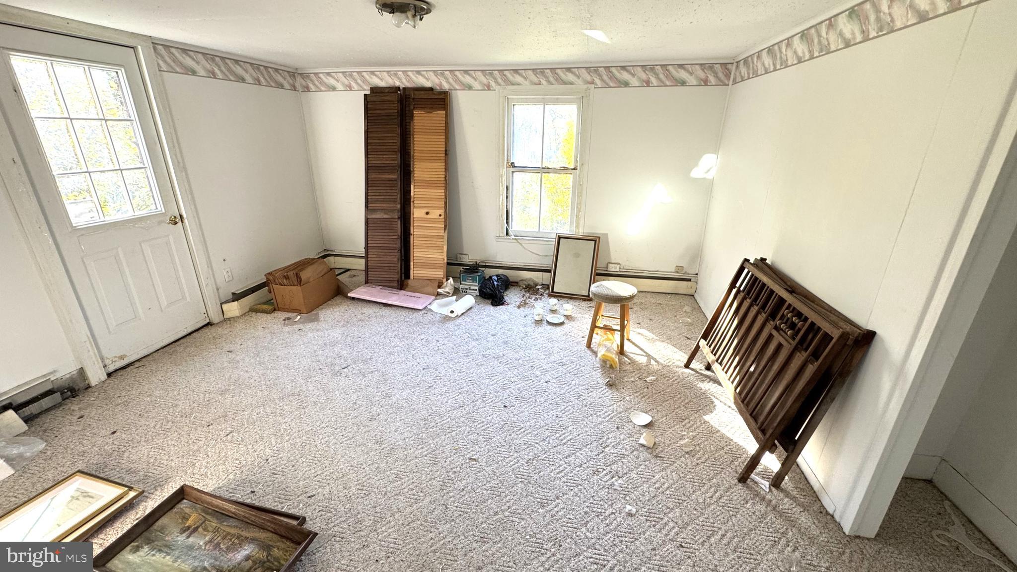 28207 Nanticoke Road Salisbury, MD 21801 - Photo 15 of 26 a very nice looking room with many windows and furniture