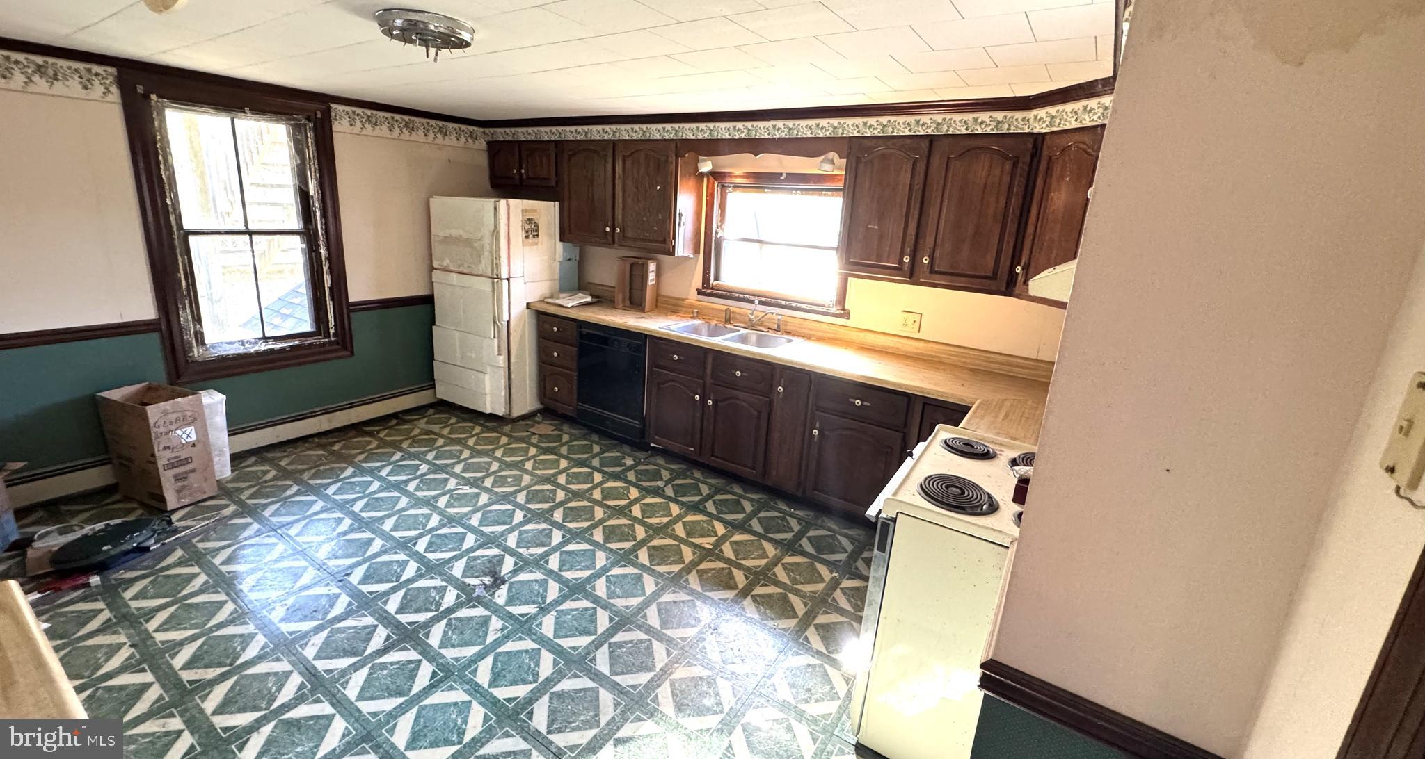 28207 Nanticoke Road Salisbury, MD 21801 - Photo 5 of 26 a room with a wooden floor and windows