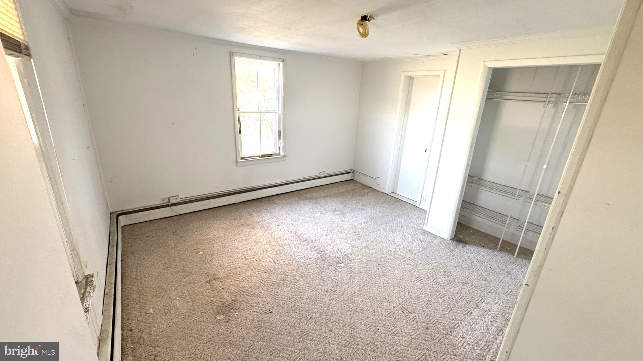 28207 Nanticoke Road Salisbury, MD 21801 - Photo 7 of 26 an empty room with windows