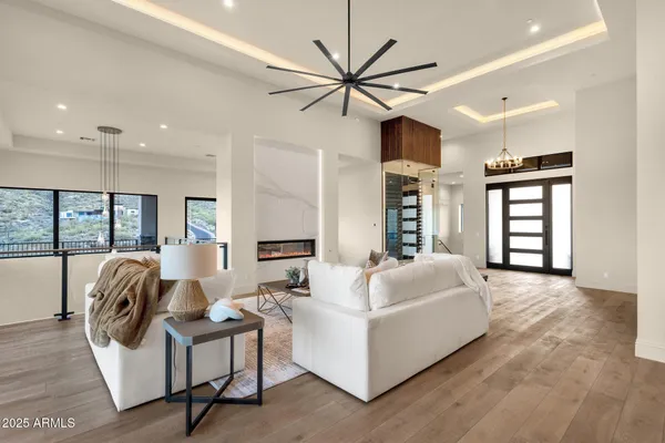 a kitchen with kitchen island granite countertop a sink stove and refrigerator