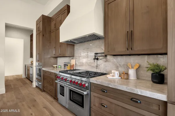 a spacious bathroom with a bathtub and shower