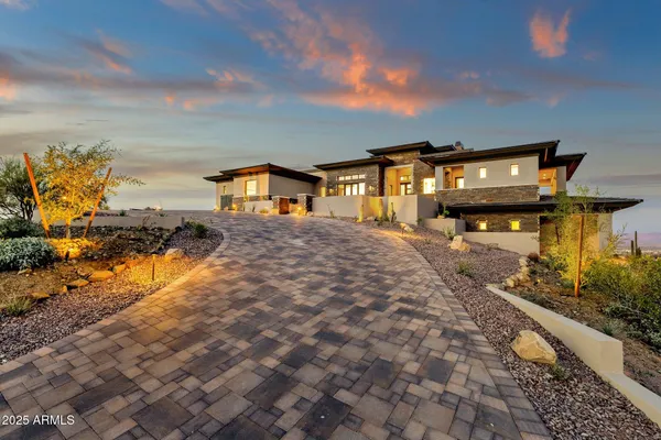 a view of a living room and kitchen