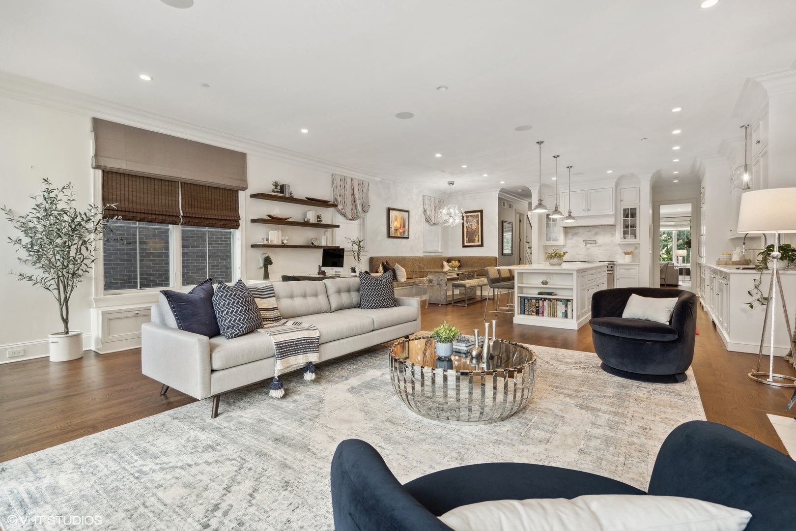 3740 North Wayne Avenue Chicago, IL 60613 - Photo 15 of 55 a living room with furniture kitchen view and a large window