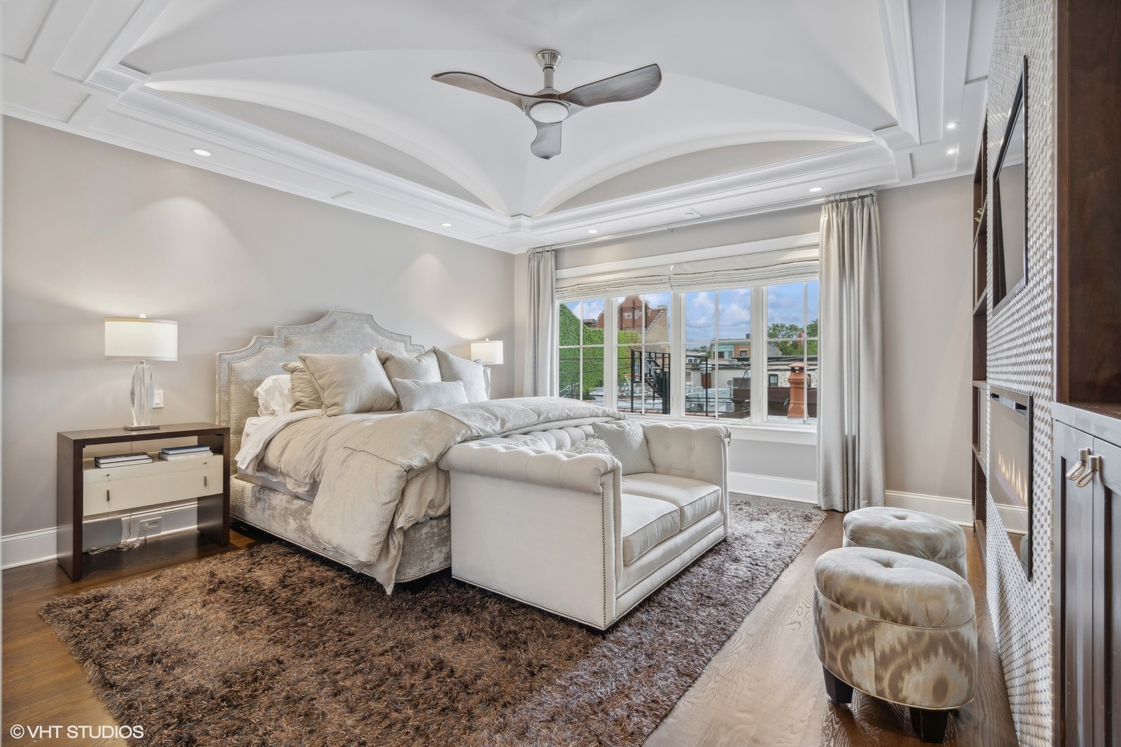 3740 North Wayne Avenue Chicago, IL 60613 - Photo 17 of 55 a bedroom with a bed and a large window