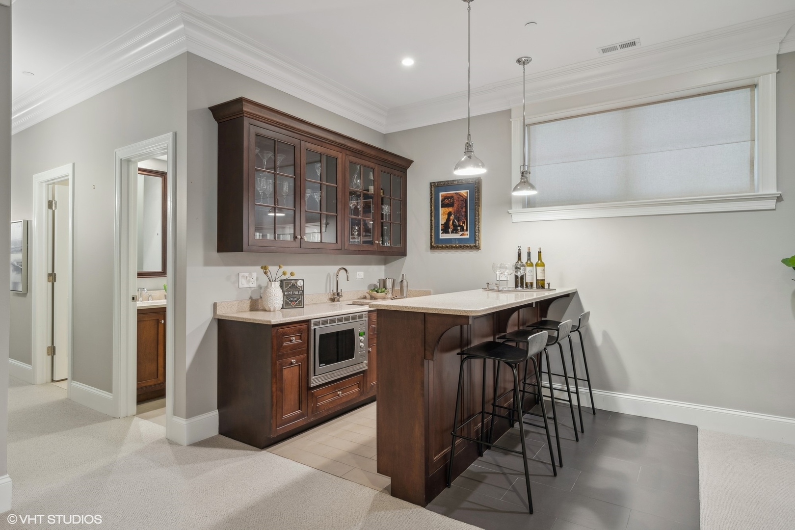 3740 North Wayne Avenue Chicago, IL 60613 - Photo 39 of 55 a kitchen with stainless steel appliances granite countertop a sink and a refrigerator