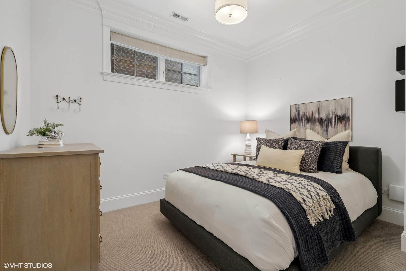 3740 North Wayne Avenue Chicago, IL 60613 - Photo 42 of 55 a bed room with a bed and a mirror