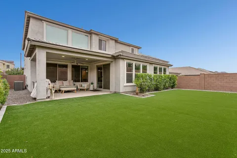 a view of backyard with garden and flowers