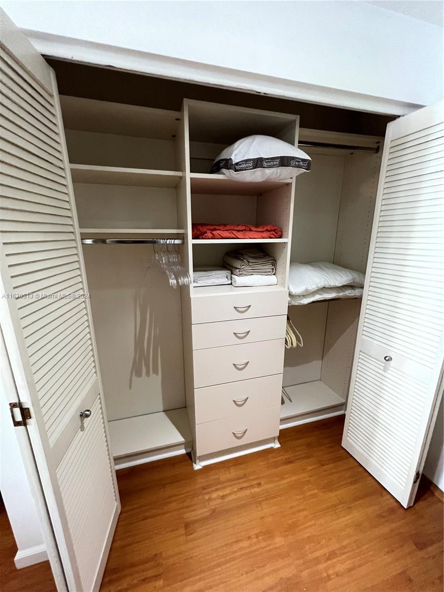 801 Brickell Key Boulevard, Unit 1506 Miami, FL 33131 - Photo 12 of 23 a view of a walk in closet