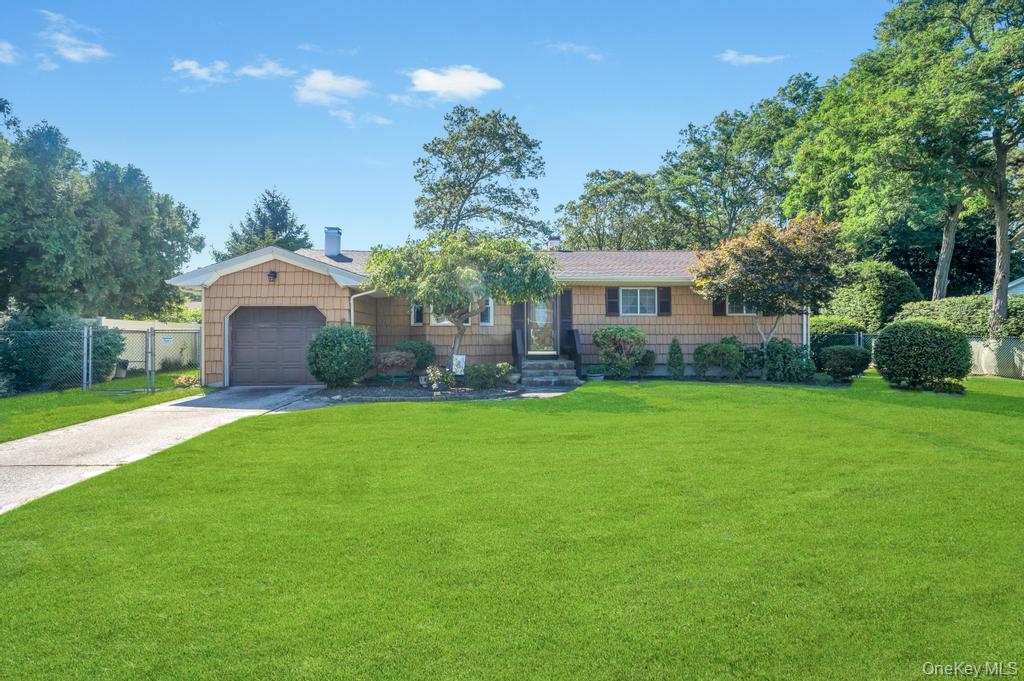 412 No Tree Road Centereach, NY 11720 - Photo 1 of 1 Single story home with driveway and an attached garage