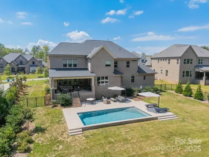 an aerial view of a house with a garden