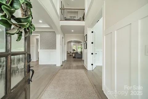 a view of a hallway view with staircase