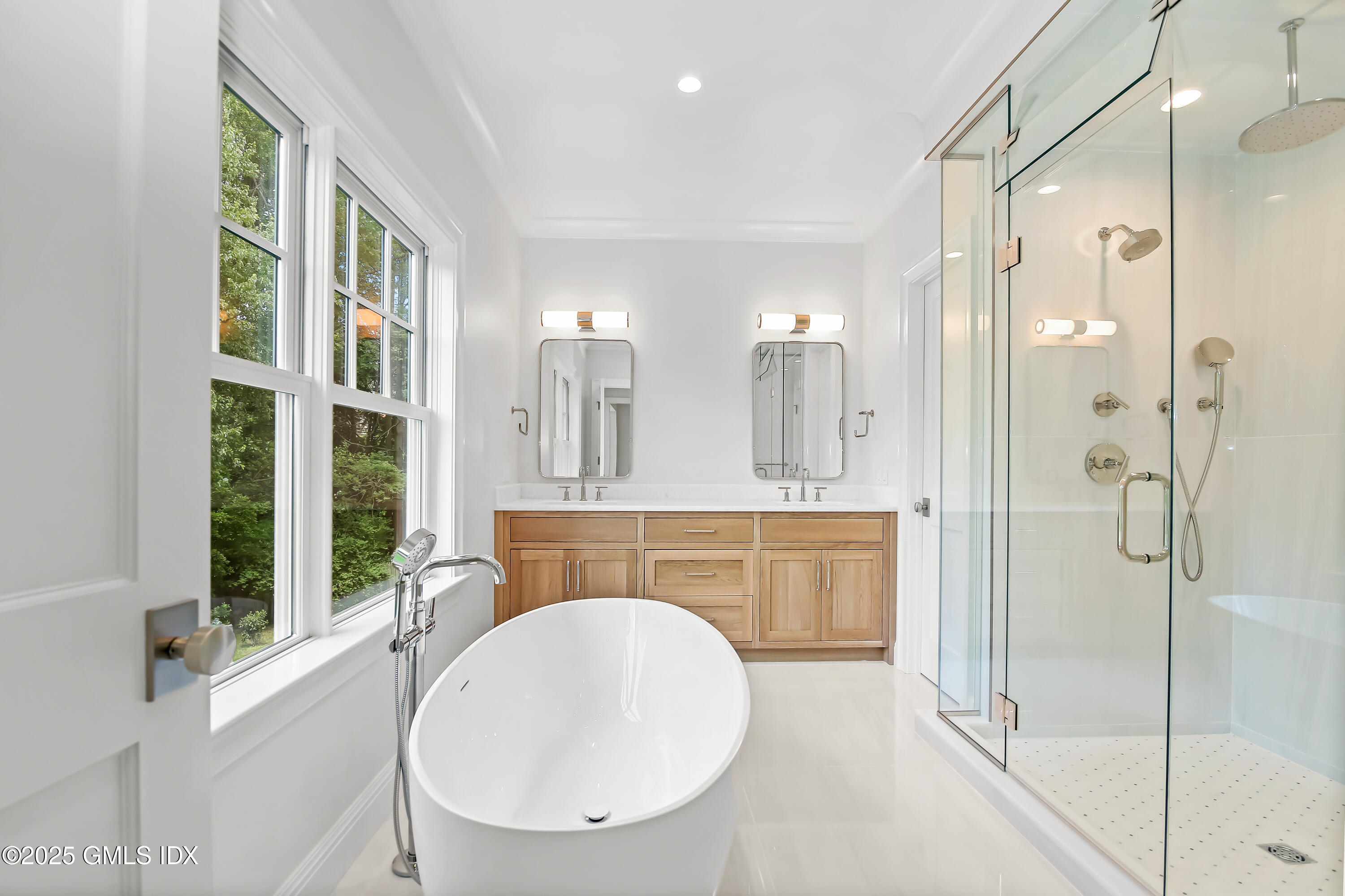 11 Morningside Drive Greenwich, CT 06830 - Photo 11 of 13 a bathroom with a double vanity sink mirror and shower