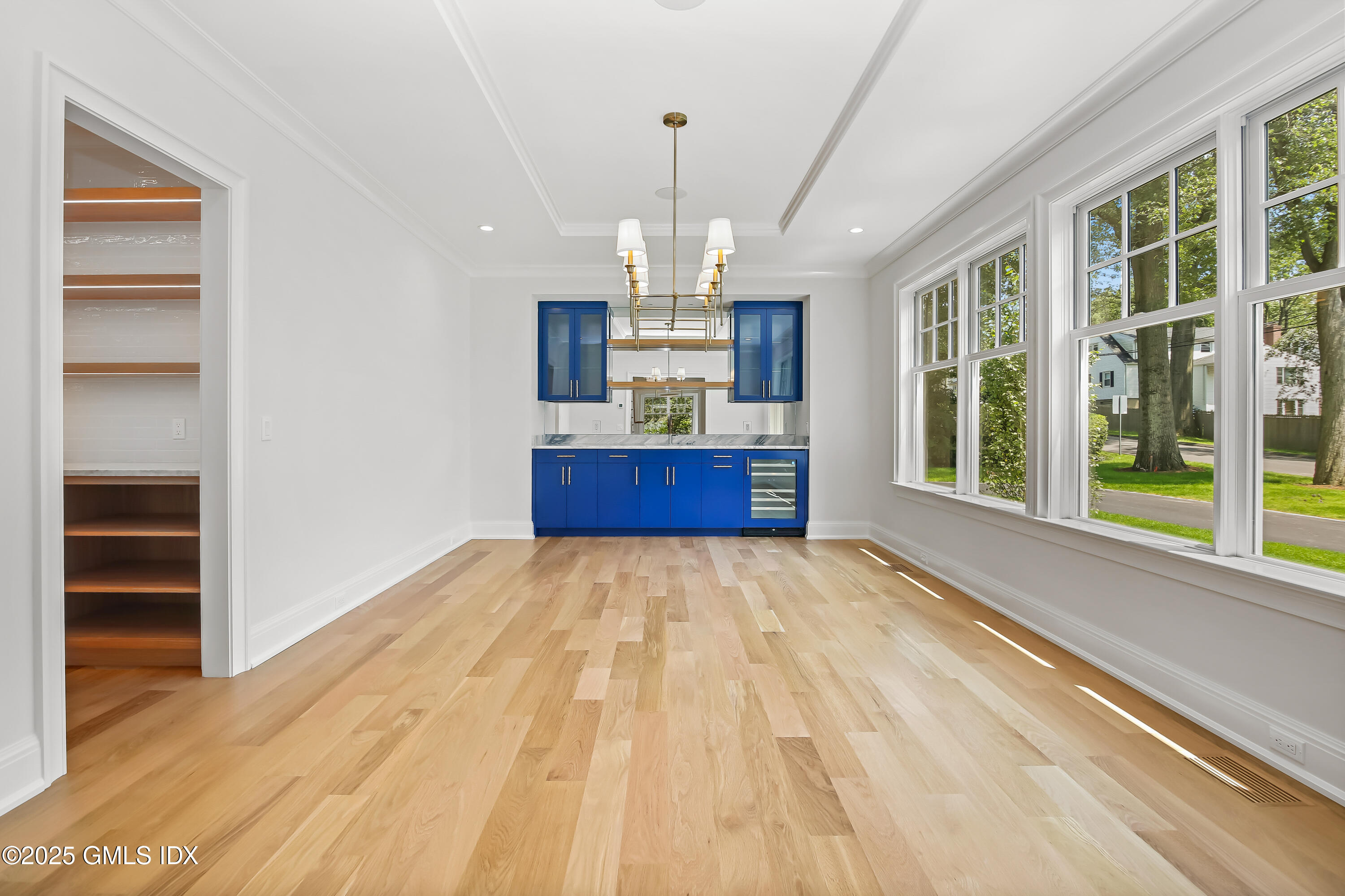 11 Morningside Drive Greenwich, CT 06830 - Photo 8 of 13 a view of empty room with wooden floor and window