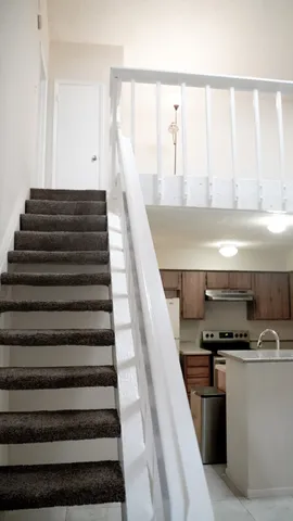 a view of entryway and kitchen