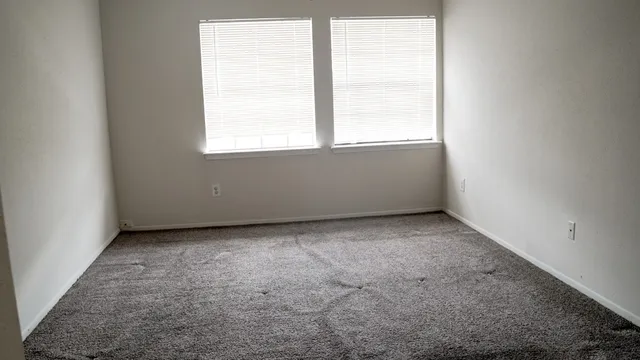 an empty room with a window