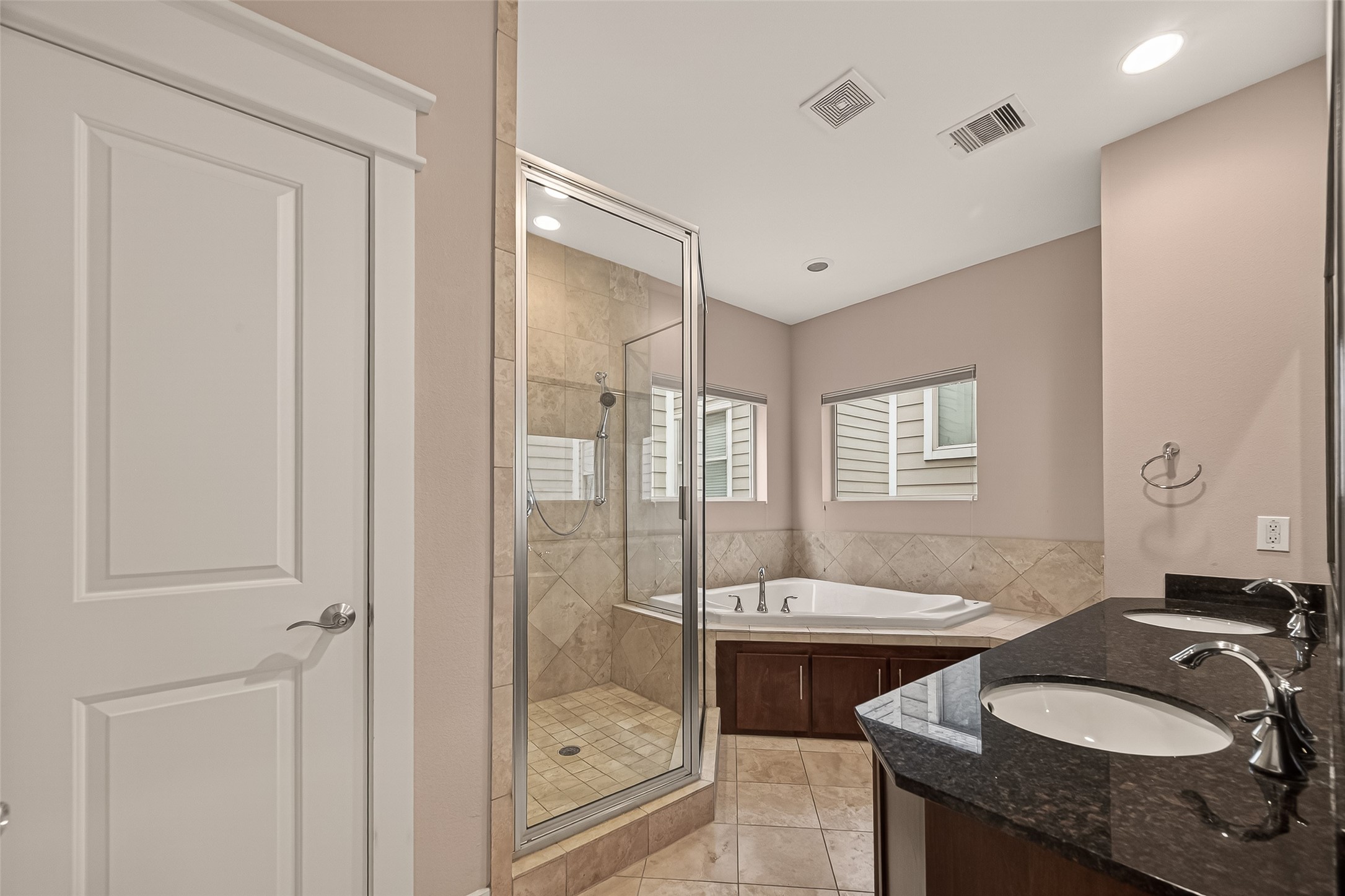1510 Crockett Street, Unit B Houston, TX 77007 - Photo 26 of 32 a bathroom with a sink double vanity and a shower