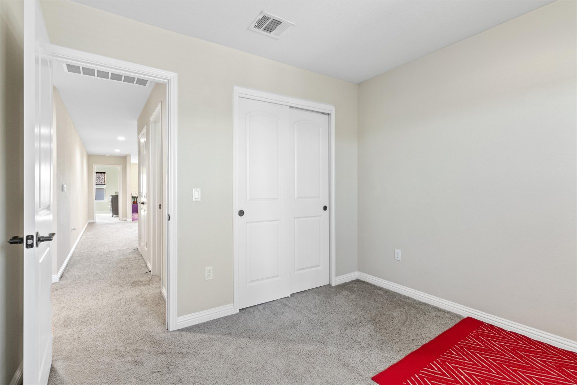 9404 Ocean Going Court Austin, TX 78748 - Photo 27 of 40 a view of a room with wooden floor and bathroom