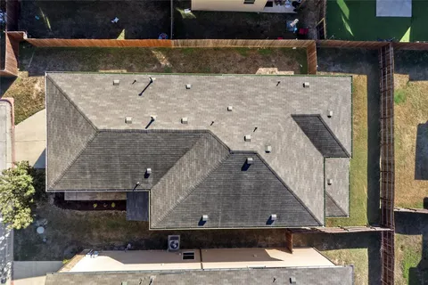 a car and bike parked in a room