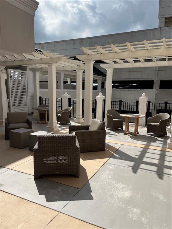 106 Spring Street Gainesville, GA 30501 - Photo 13 of 19 a view of a lobby with furniture and fireplace