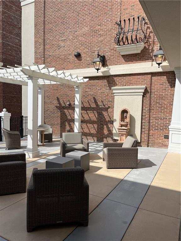 106 Spring Street Gainesville, GA 30501 - Photo 14 of 19 a living room with fireplace furniture and a fireplace