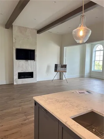 a view of a kitchen with a sink and dishwasher