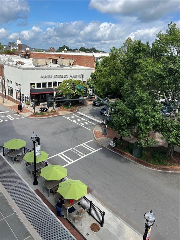 106 Spring Street Gainesville, GA 30501 - Photo 4 of 19 an outdoor space with furniture