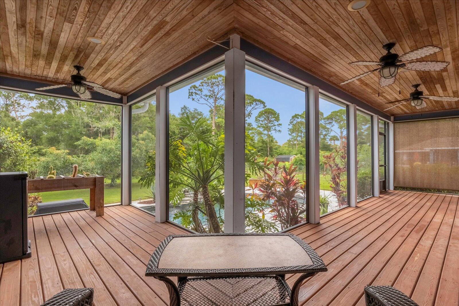 4349 Hunter Road Mims, FL 32754 - Photo 28 of 36 Screened back porch