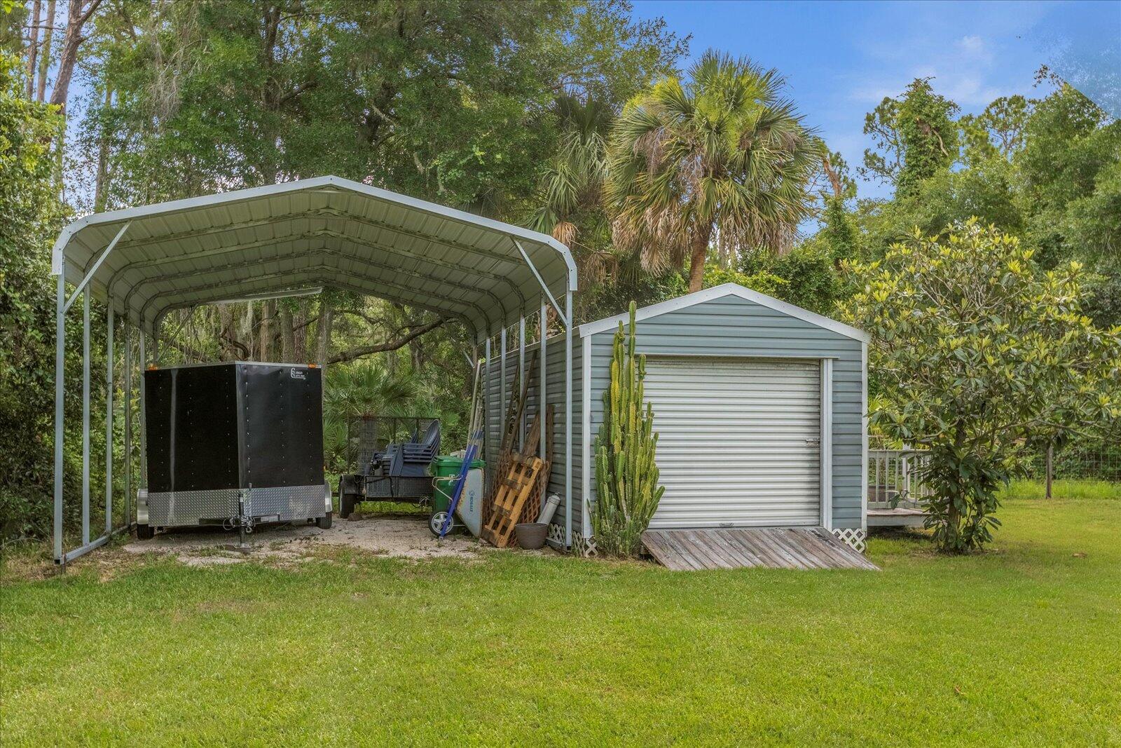 4349 Hunter Road Mims, FL 32754 - Photo 32 of 36 Additional covered parking and workshop